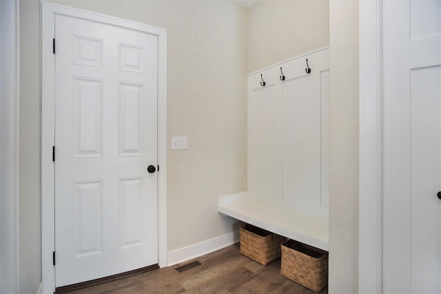 mudroom with dark hardwood / wood-style floors