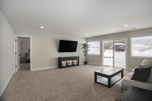 living room featuring light carpet