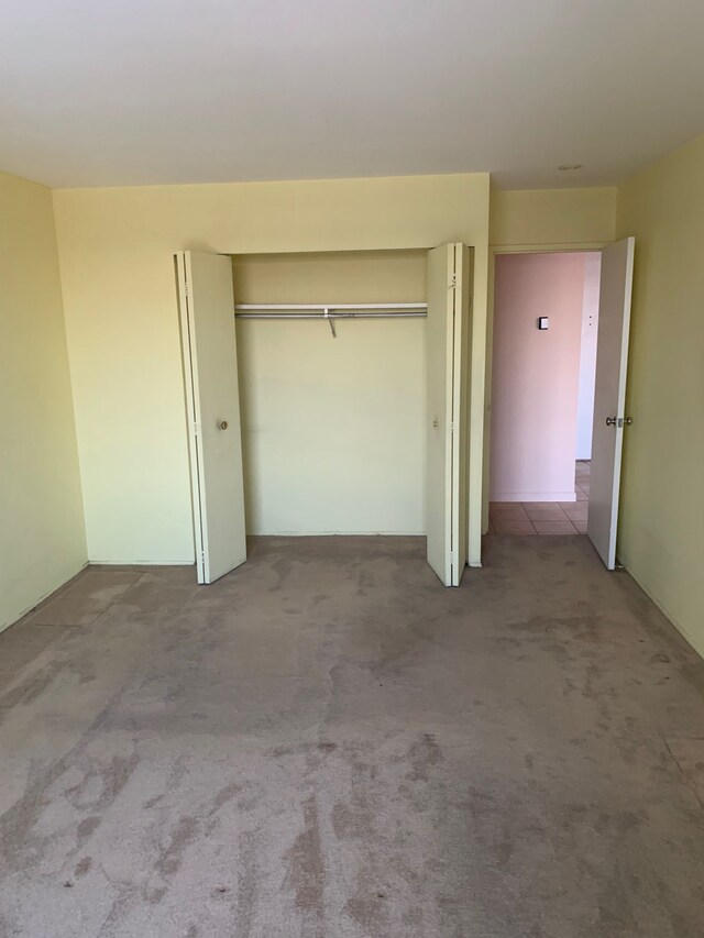 unfurnished bedroom featuring carpet