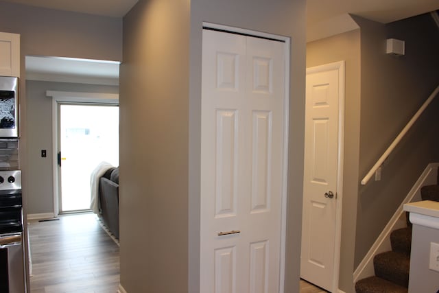 hallway featuring light hardwood / wood-style floors