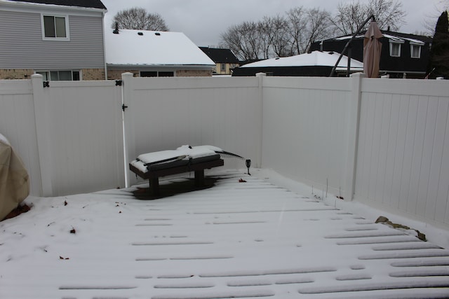 view of snow covered patio