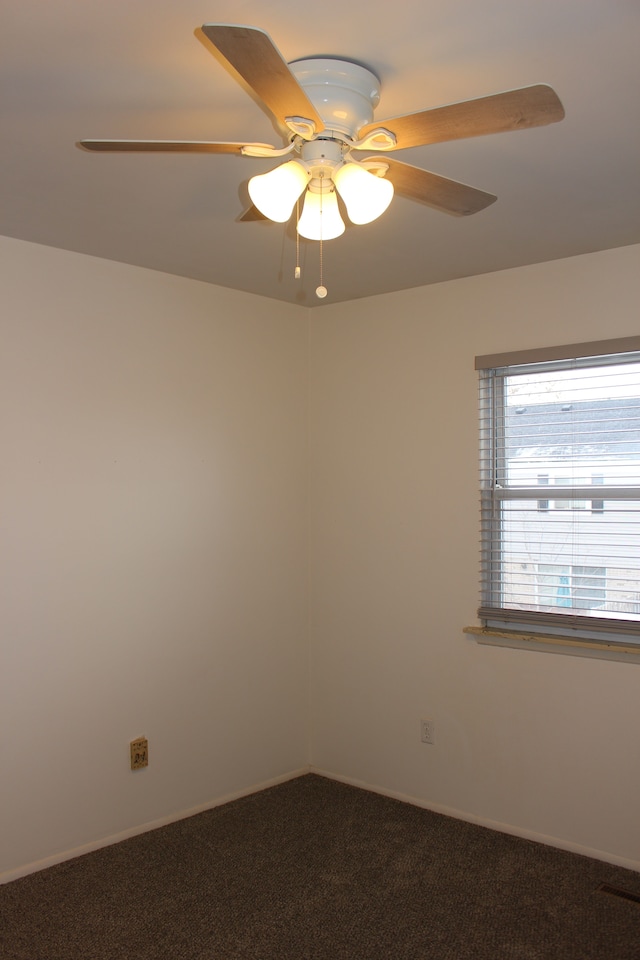 unfurnished room with carpet and ceiling fan