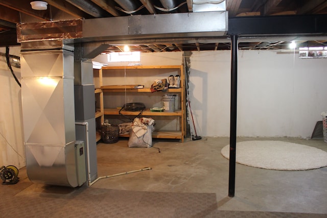 basement featuring heating unit