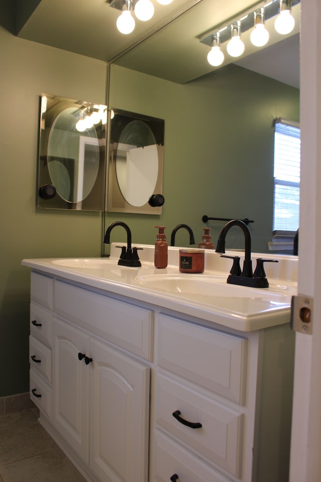 bathroom featuring tile patterned floors and vanity