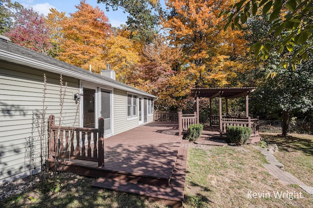 view of yard featuring a pergola and a deck