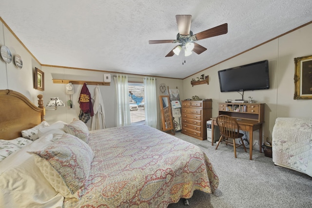 carpeted bedroom featuring ceiling fan, ornamental molding, and a textured ceiling