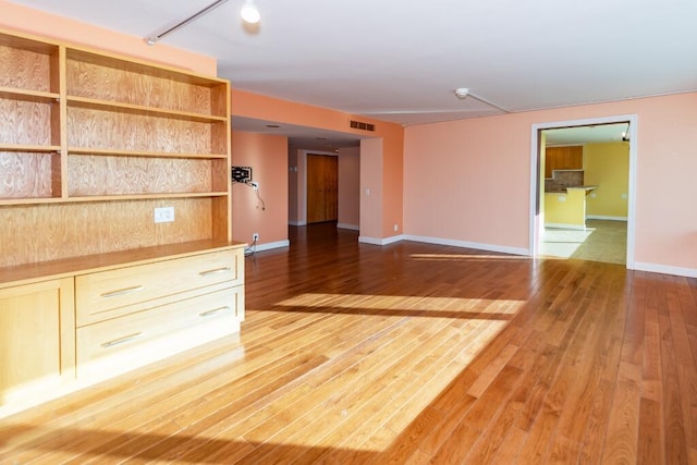 interior space with hardwood / wood-style flooring