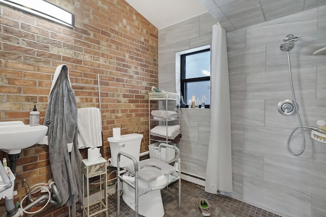 bathroom with tile patterned floors, toilet, and walk in shower