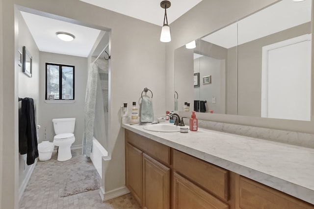 full bathroom with shower / bath combo, vanity, and toilet