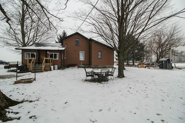 view of snow covered house