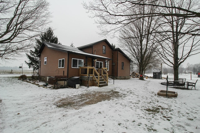 view of snow covered house