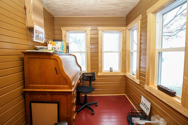 home office featuring wood walls