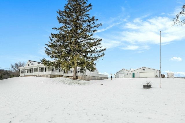 view of yard layered in snow