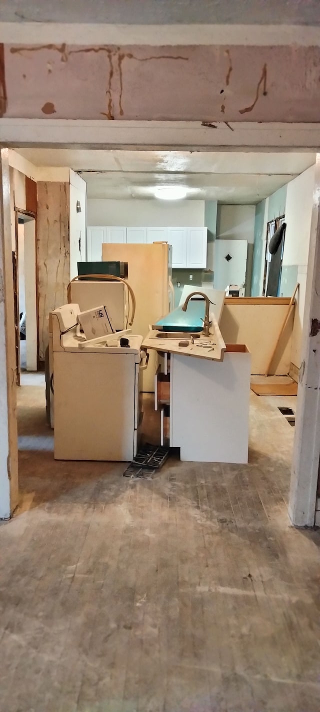 interior space with washer and clothes dryer