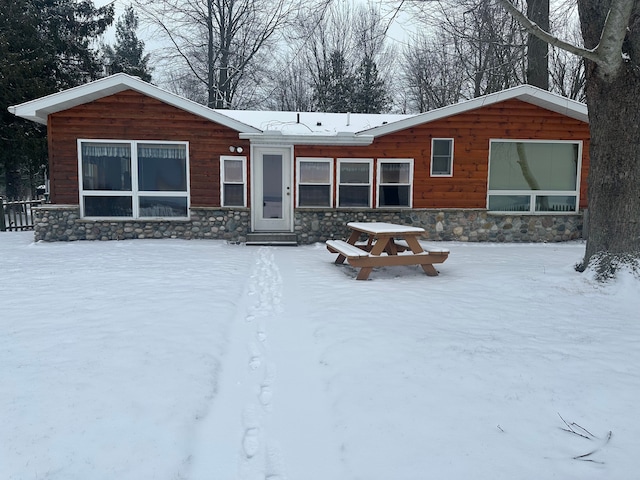 view of snow covered house