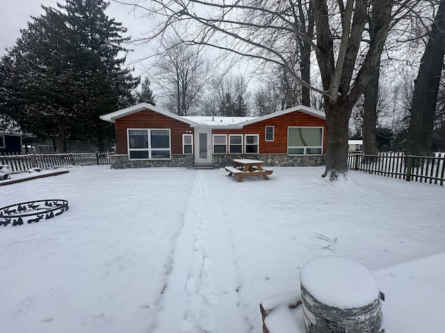 view of snow covered property