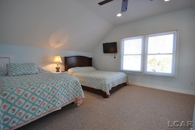 carpeted bedroom with ceiling fan and lofted ceiling