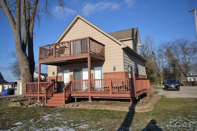 back of house with a balcony