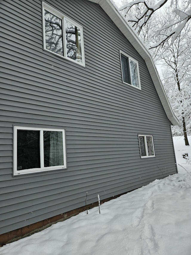 view of snow covered property