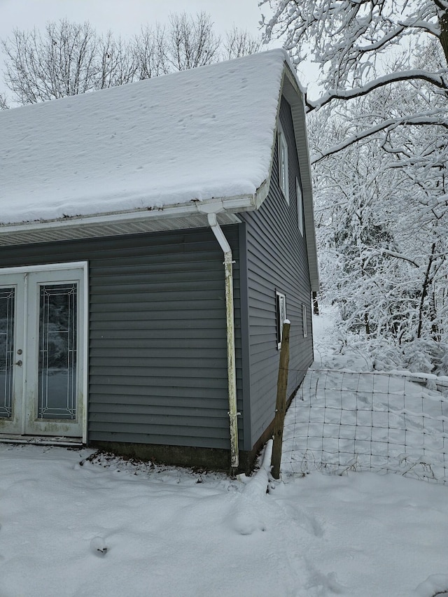 view of snow covered property