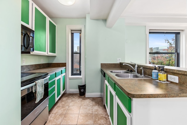 kitchen featuring beam ceiling, sink, stainless steel appliances, light tile patterned floors, and white cabinets