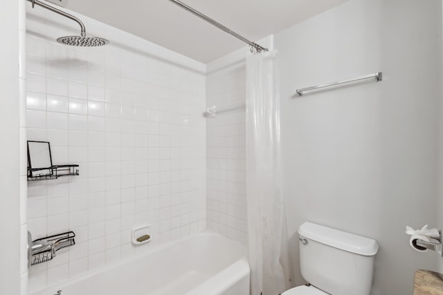 bathroom with shower / bath combination with curtain and toilet