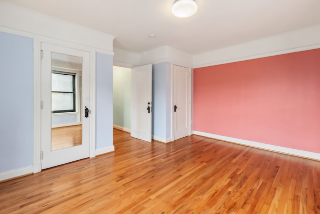 unfurnished bedroom featuring light hardwood / wood-style flooring