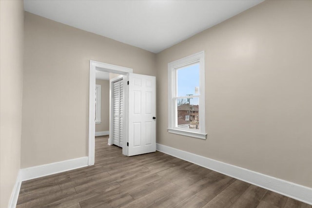 unfurnished bedroom featuring hardwood / wood-style floors