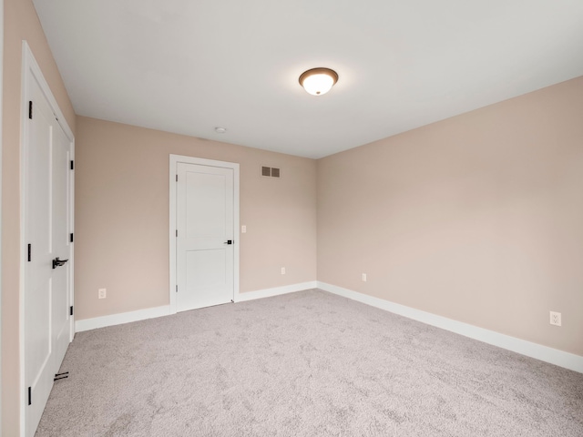 empty room with light carpet