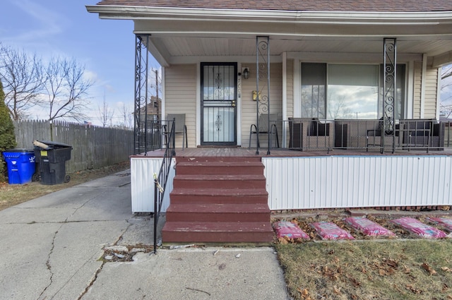 doorway to property featuring a porch