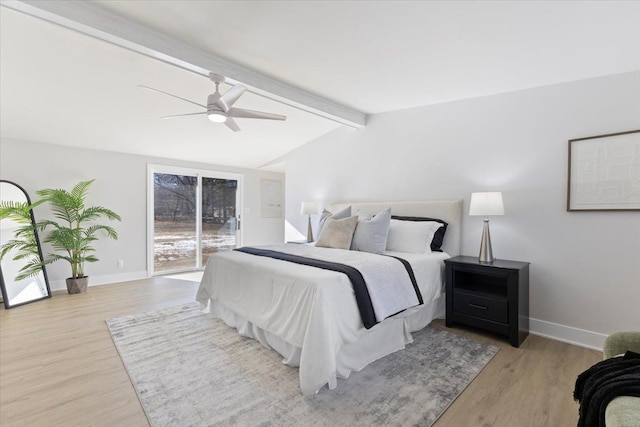 bedroom with access to outside, vaulted ceiling with beams, ceiling fan, and light wood-type flooring