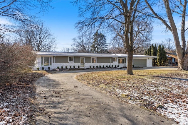 ranch-style house with a garage