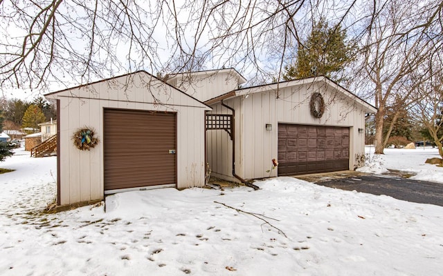 view of snow covered garage