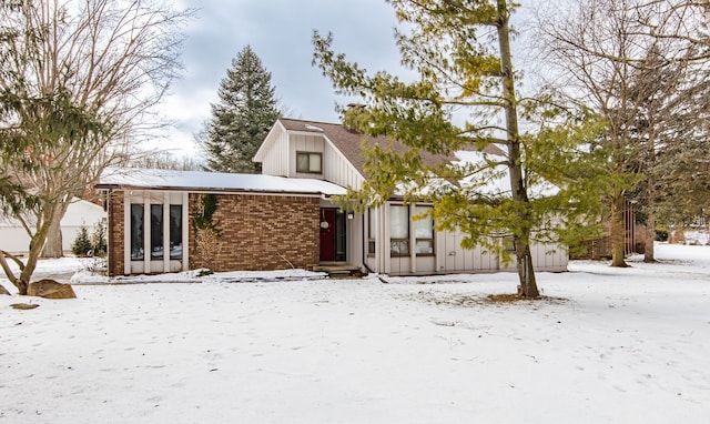 view of snow covered property