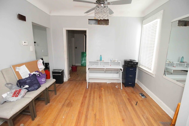 interior space featuring ceiling fan and light hardwood / wood-style flooring