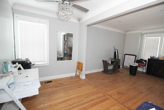 miscellaneous room with hardwood / wood-style flooring and ceiling fan