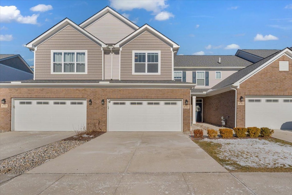 view of front of home with a garage