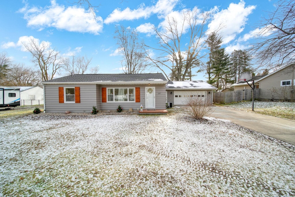 single story home with a garage