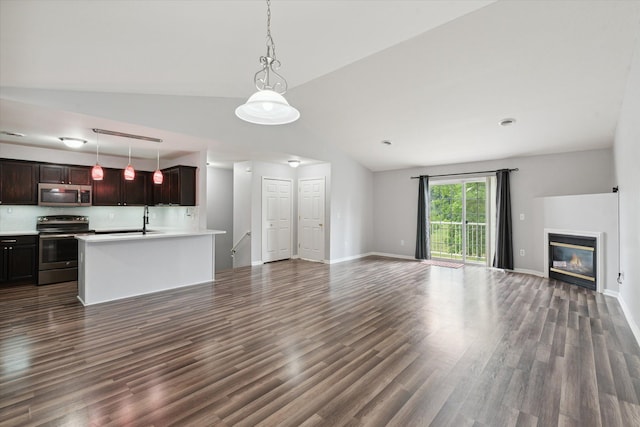 unfurnished living room featuring dark hardwood / wood-style flooring, lofted ceiling, and sink