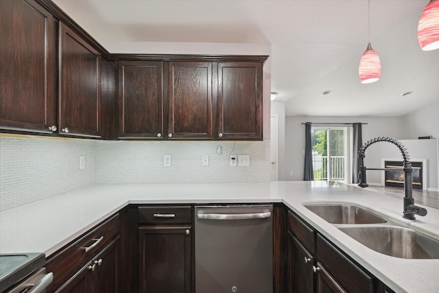 kitchen with decorative backsplash, sink, stainless steel dishwasher, and dark brown cabinets