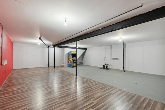 basement with wood-type flooring