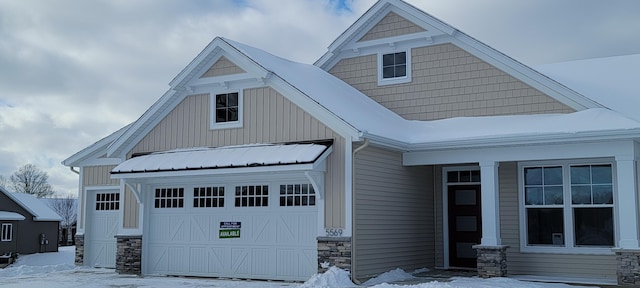 view of front of property featuring a garage