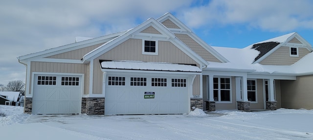 craftsman-style house featuring a garage