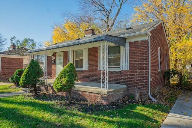 view of front of home with a front yard