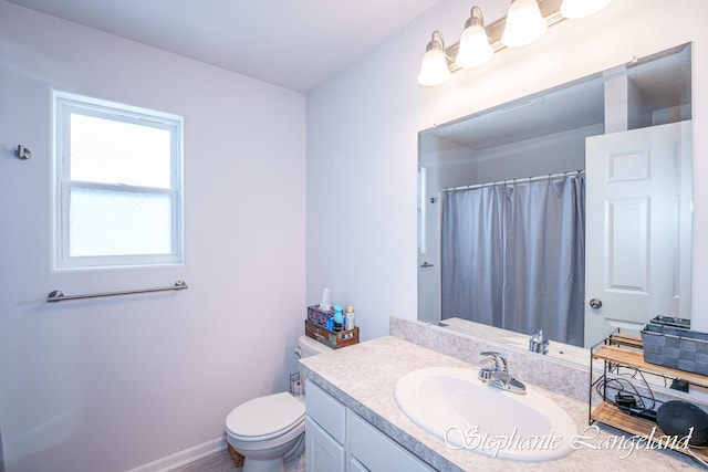 5337 Division Ave N, Comstock Park, MI 49321 - full bathroom with toilet, vanity, and a shower with curtain