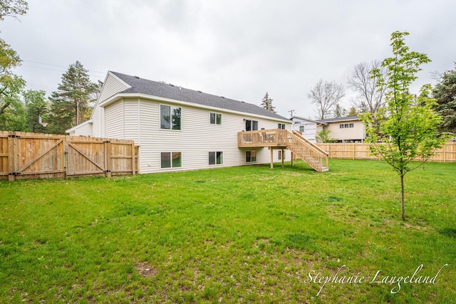 5337 Division Ave N, Comstock Park, MI 49321 - rear view of property featuring stairway, a deck, and a gate