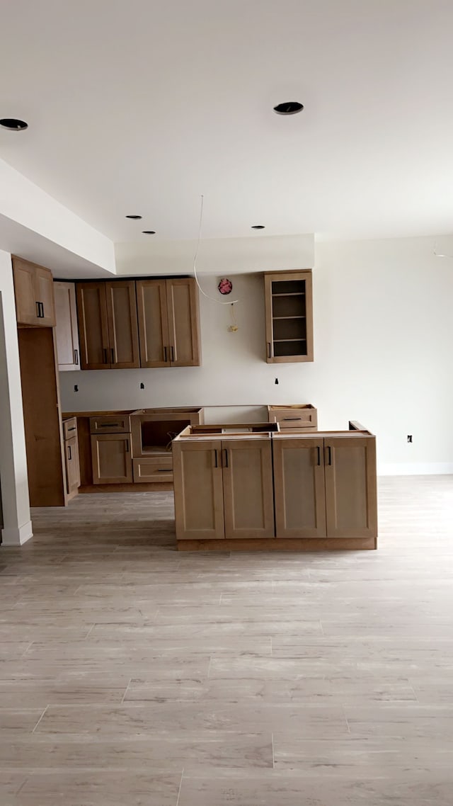 kitchen with light wood-type flooring