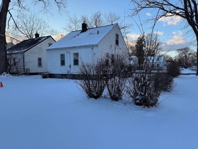 view of snow covered property