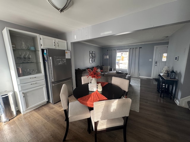 dining space featuring hardwood / wood-style floors