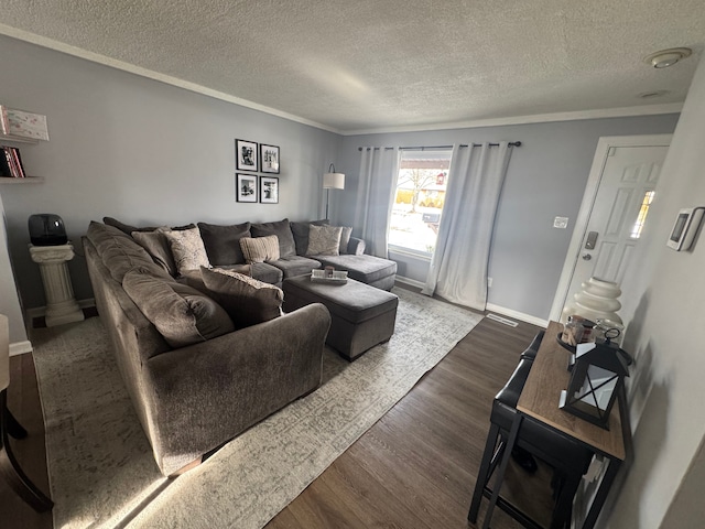 living room with hardwood / wood-style flooring and a textured ceiling